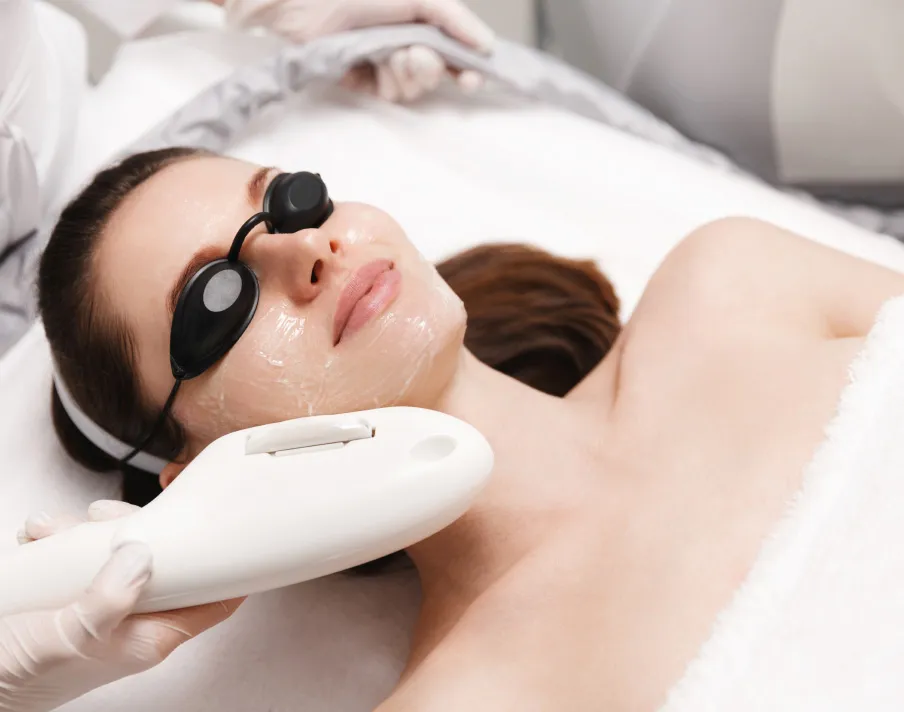 Client receiving a Clear Diamond laser facial treatment at AV Glow Bar